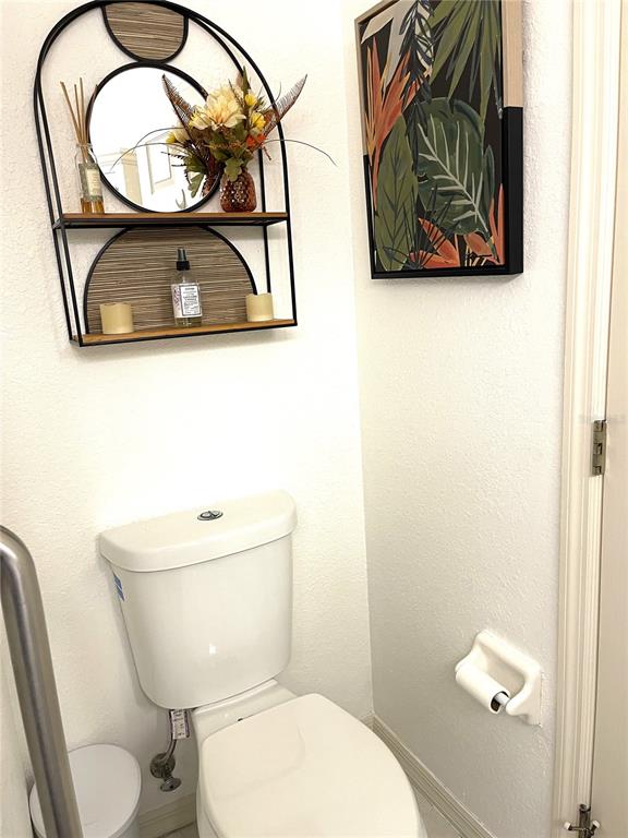 5941 Velvet Loop Lakeland, FL 33811 - Photo 26 of 61 a bathroom with a toilet and a sink
