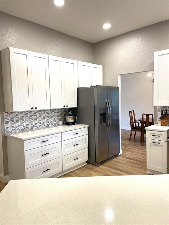 5941 Velvet Loop Lakeland, FL 33811 - Photo 29 of 61 a kitchen with a refrigerator and cabinets