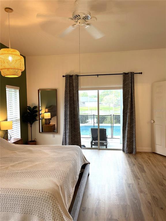 5941 Velvet Loop Lakeland, FL 33811 - Photo 47 of 61 a bed room with a bed and a large window