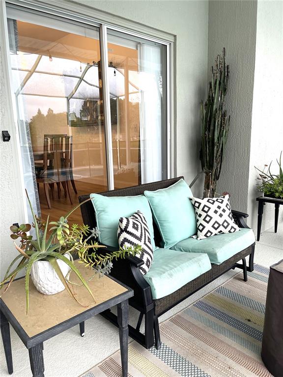 5941 Velvet Loop Lakeland, FL 33811 - Photo 57 of 61 a living room with furniture and a potted plant