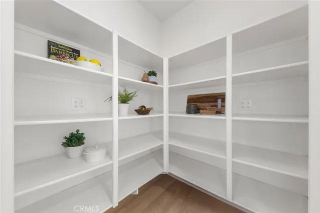 a bathroom with a shower sink and mirror