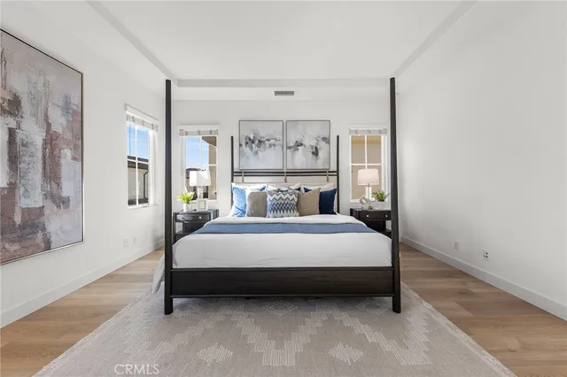 a spacious bathroom with a sink and mirror