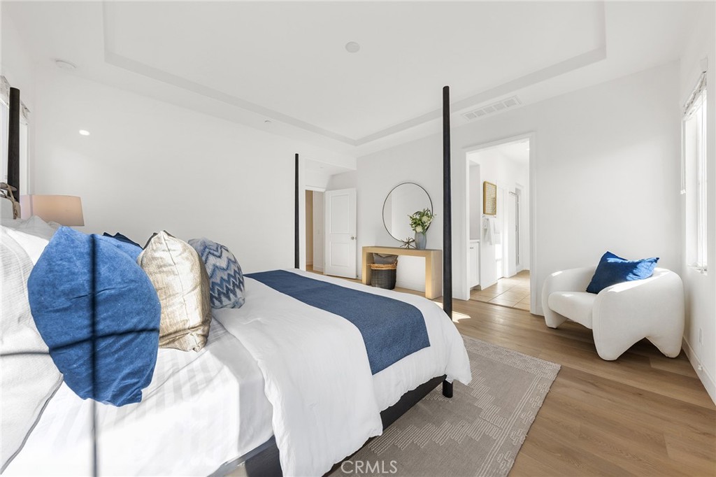 112 Velvetleaf Irvine, CA 92620 - Photo 31 of 51 a bedroom with a bed mirror and window