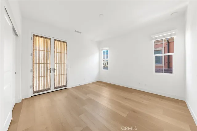 a bathroom with a double vanity sink mirror and shower