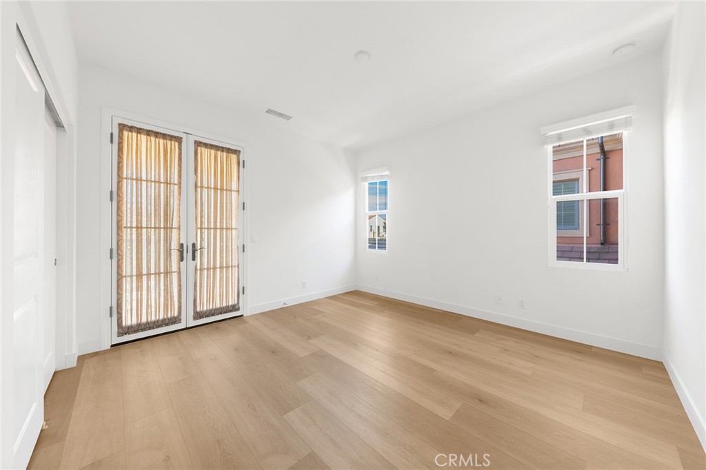 112 Velvetleaf Irvine, CA 92620 - Photo 36 of 51 an empty room with windows