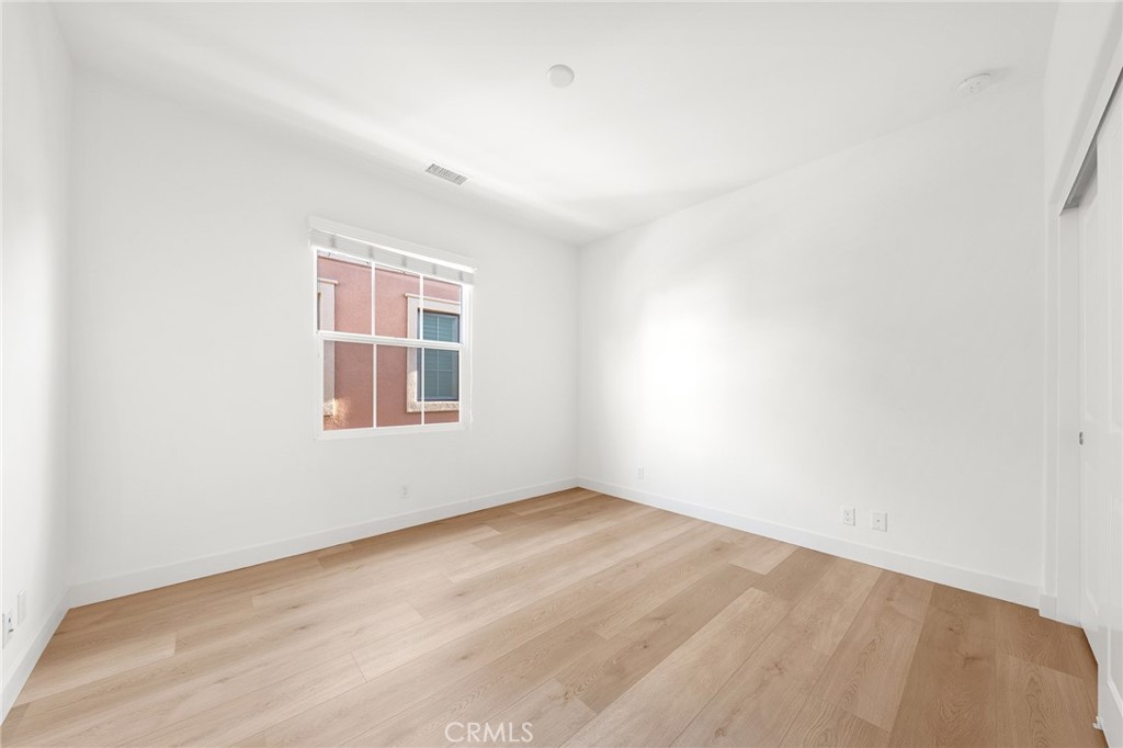 112 Velvetleaf Irvine, CA 92620 - Photo 39 of 51 an empty room with windows