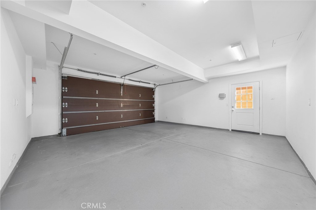 112 Velvetleaf Irvine, CA 92620 - Photo 42 of 51 a view of an empty room with a cabinet