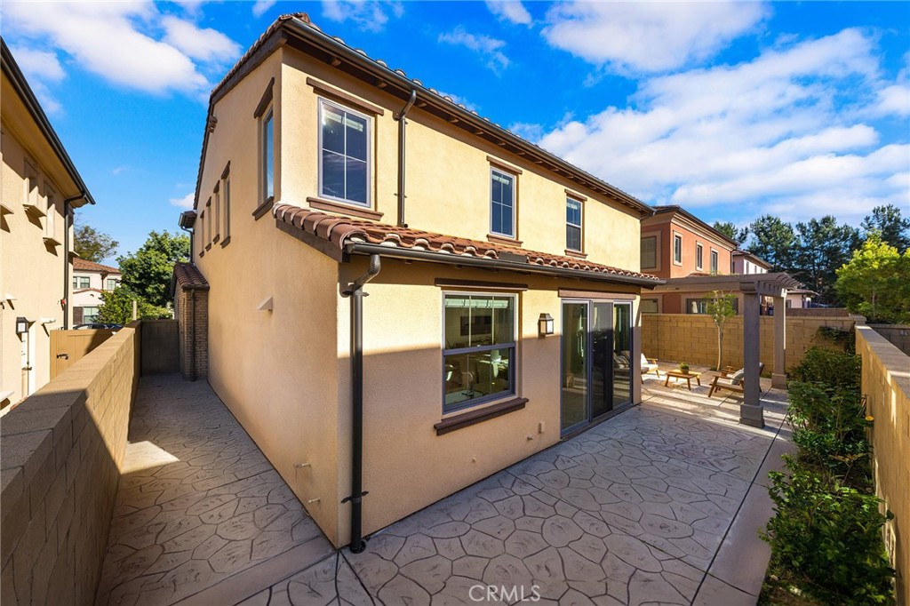 112 Velvetleaf Irvine, CA 92620 - Photo 43 of 51 a front view of a house with a yard