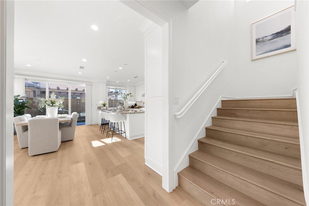 112 Velvetleaf Irvine, CA 92620 - Photo 5 of 51 a view of entryway and hall with wooden floor