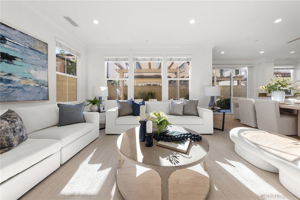 112 Velvetleaf Irvine, CA 92620 - Photo 8 of 51 a living room with furniture and a large window