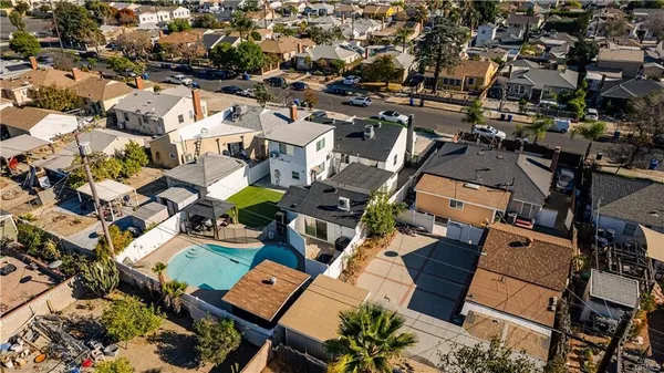 an aerial view of residential building with parking space