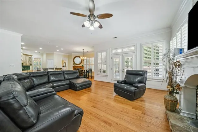 a living room with furniture fireplace and a flat screen tv