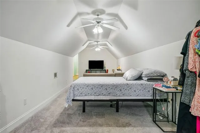 a view of a livingroom with furniture and chandelier