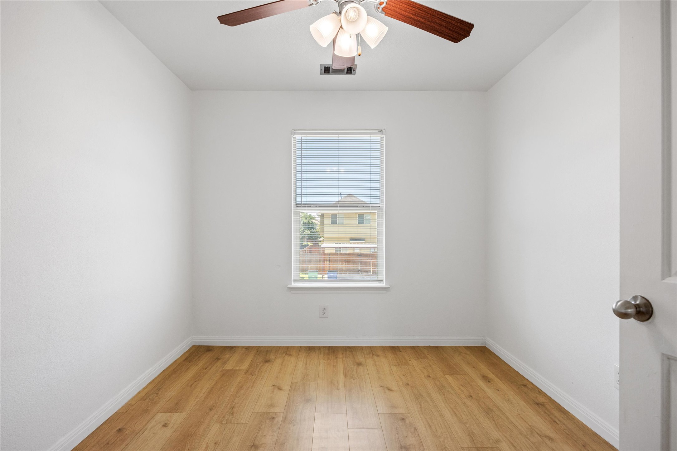 4516 Kind Way, Unit 253 Austin, TX 78725 - Photo 13 of 31 an empty room with a window