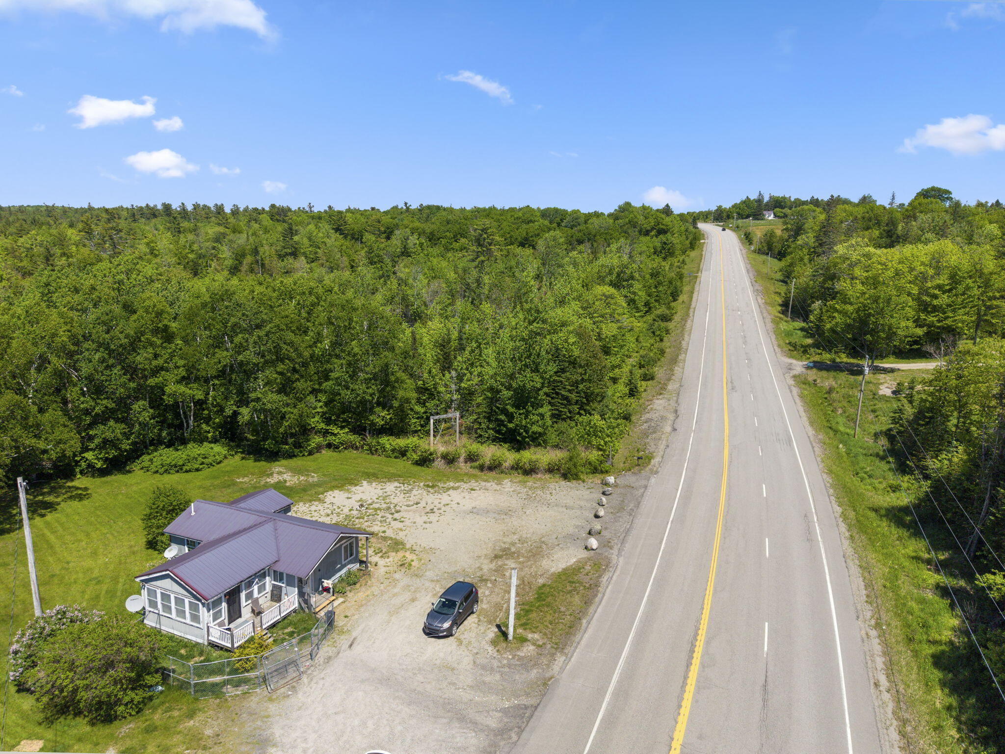 4525 Airline Road Wesley, ME 04686 - Photo 3 of 25 4-web-or-mls-DJI_20260608133918_0678_D