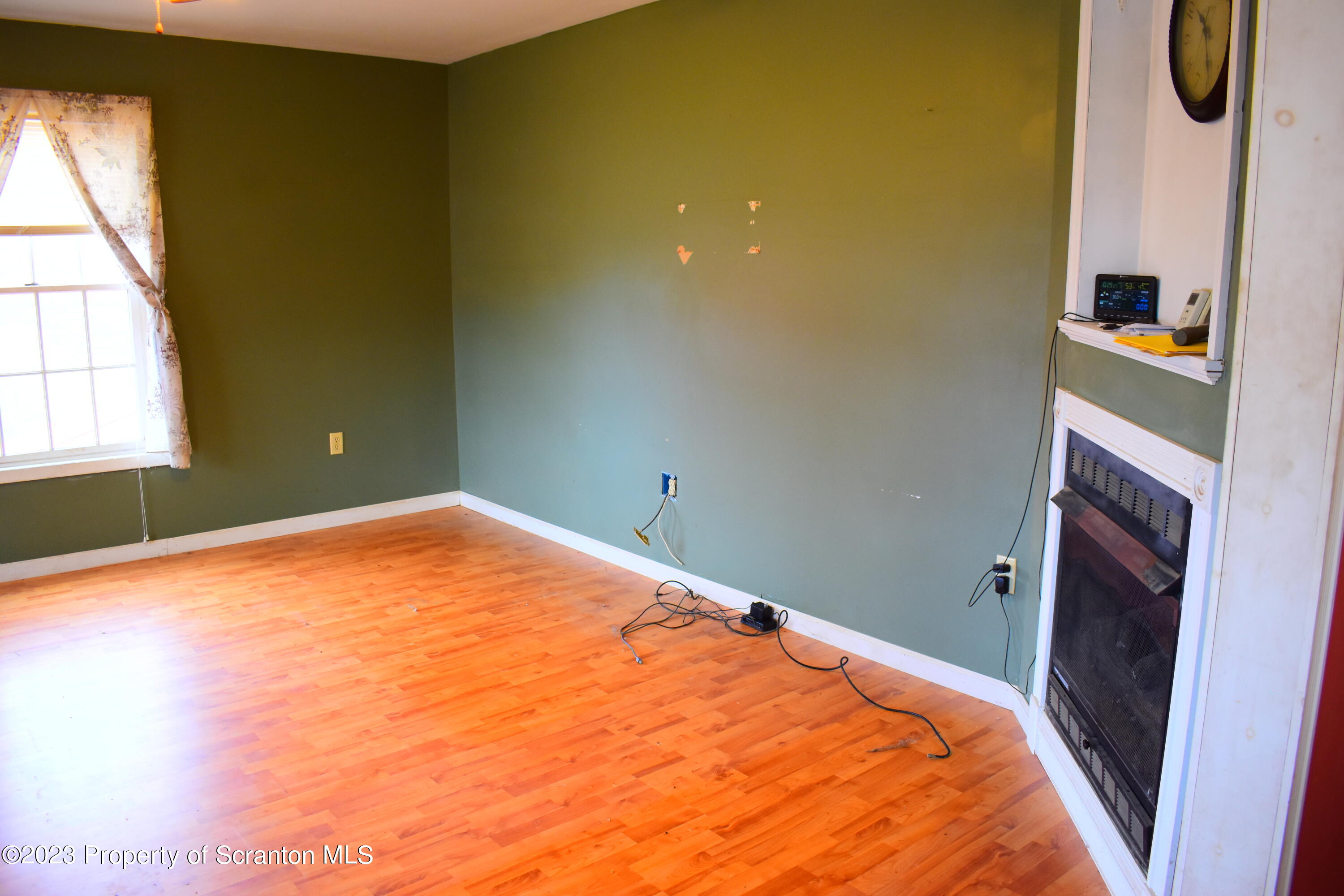 42 South Lott Road Meshoppen, PA 18630 - Photo 21 of 76 a bedroom with a bed and a window