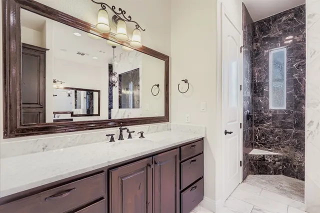 a living room with furniture and white walls