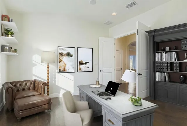 a bathroom with a granite countertop toilet and a mirror
