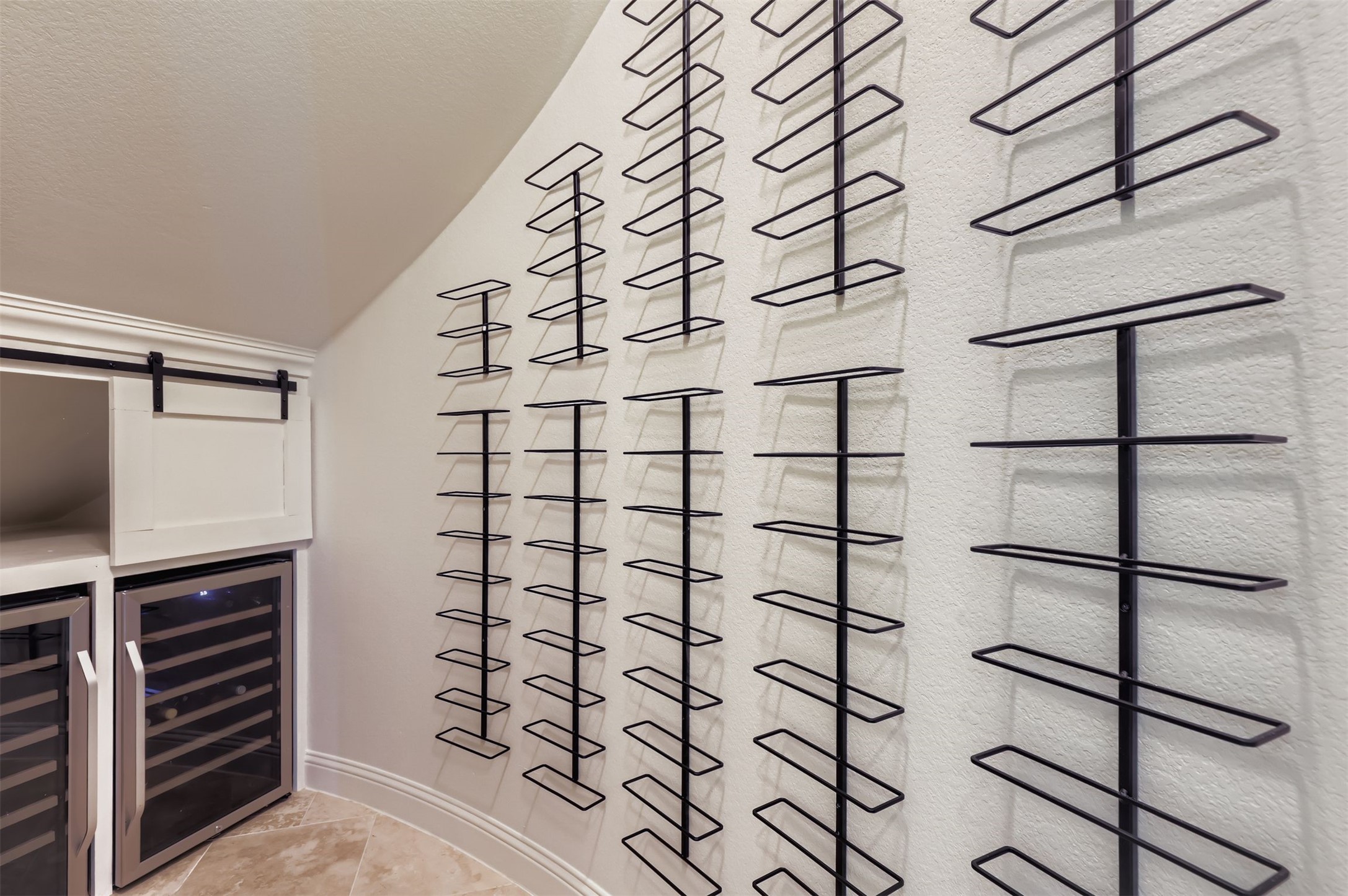 1415 Roaring Fork Leander, TX 78641 - Photo 15 of 39 Wine room featuring beverage cooler and a barn door