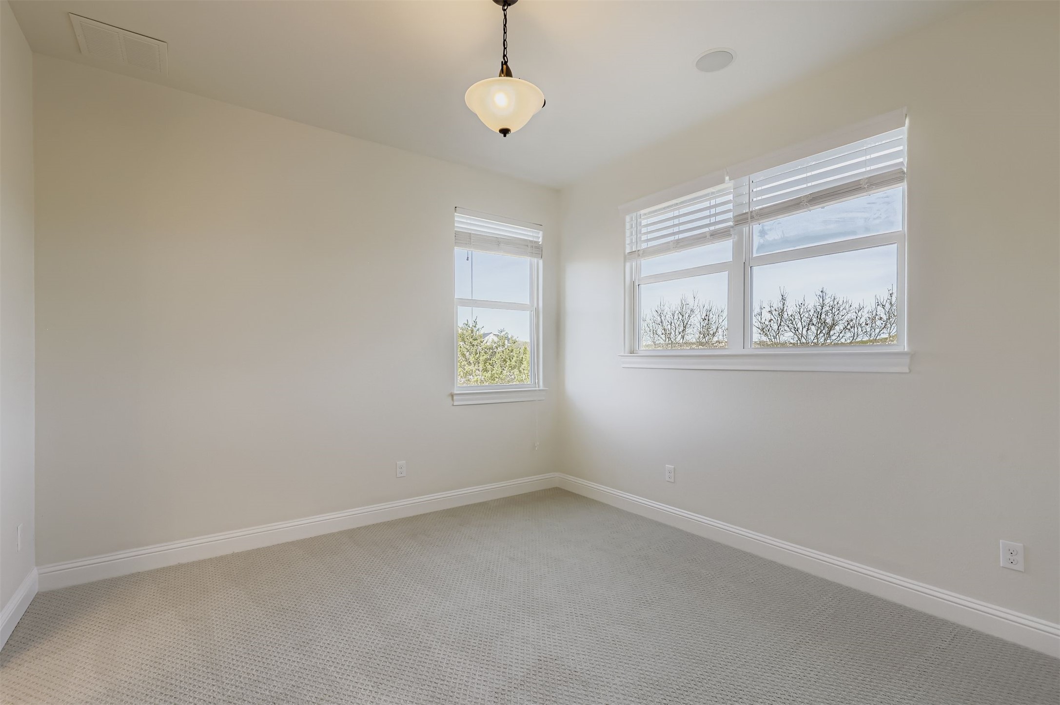 1415 Roaring Fork Leander, TX 78641 - Photo 21 of 39 Empty room with baseboards and carpet flooring
