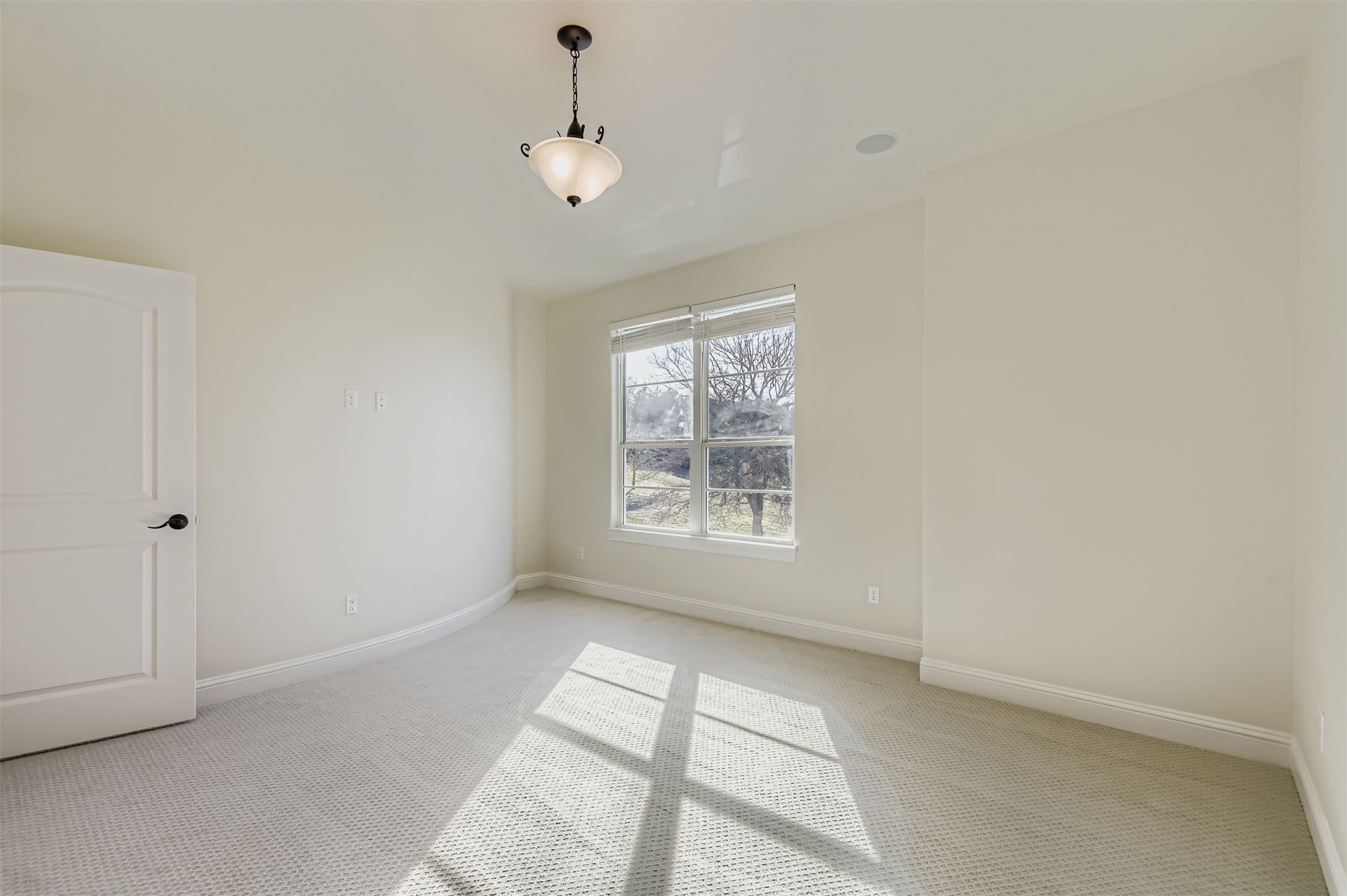1415 Roaring Fork Leander, TX 78641 - Photo 24 of 39 Empty room featuring carpet and baseboards