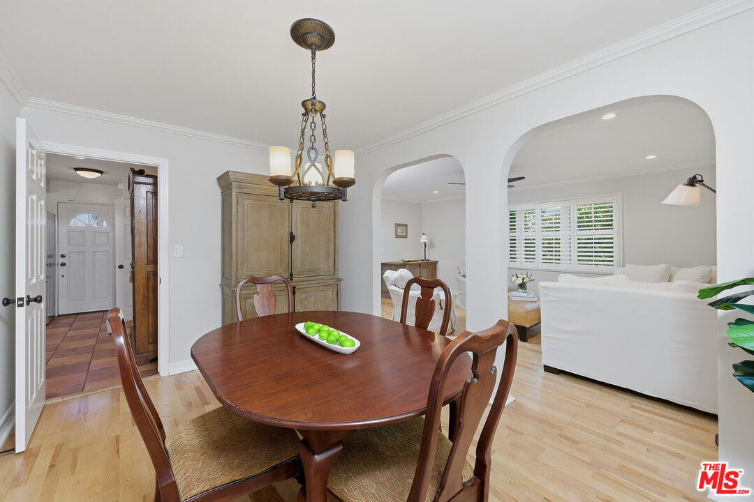 697 Washington Boulevard Marina del Rey, CA 90292 - Photo 8 of 23 a view of a dining room with furniture and wooden floor