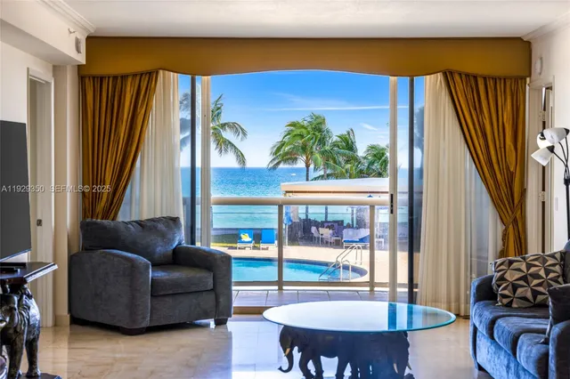 a view of a living room with furniture