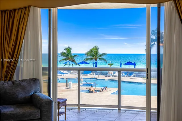 a view of a parking area with an outdoor space