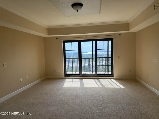 a en suite bathroom with double sink and a mirror