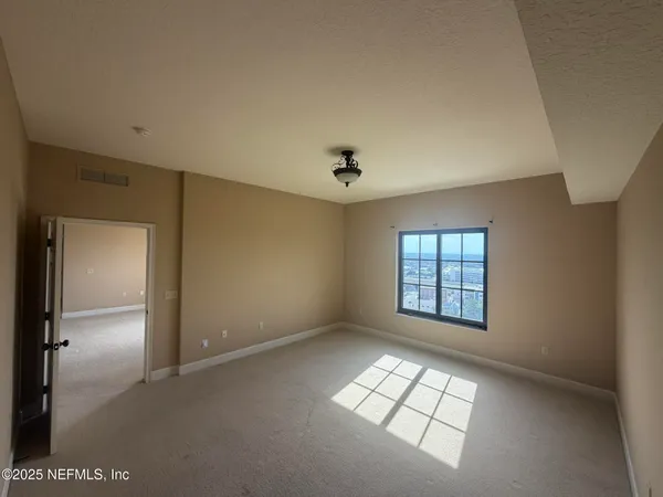 a bath tub sitting next to a toilet