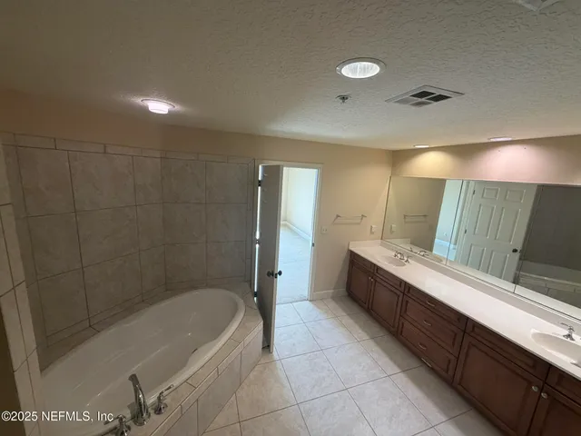 a view of a livingroom and a kitchen