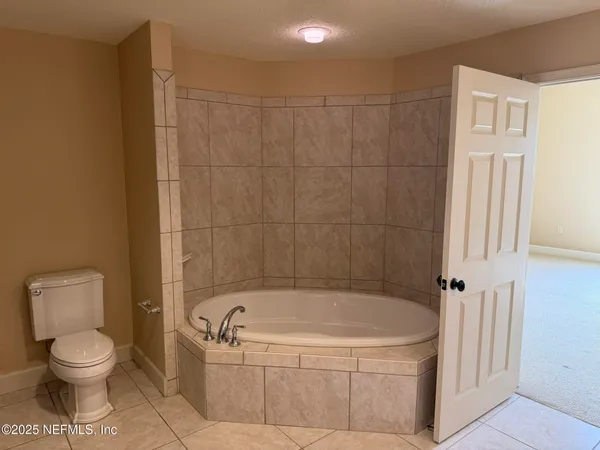 a view of a big room with wooden floor