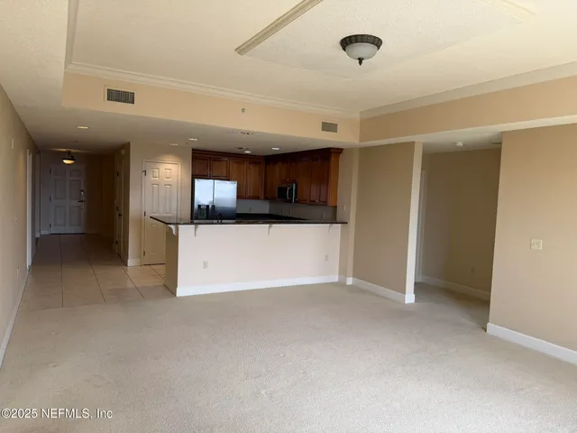 a bathroom with a sink toilet and mirror