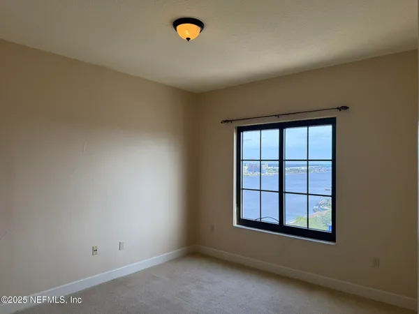 a view of a city with tall buildings