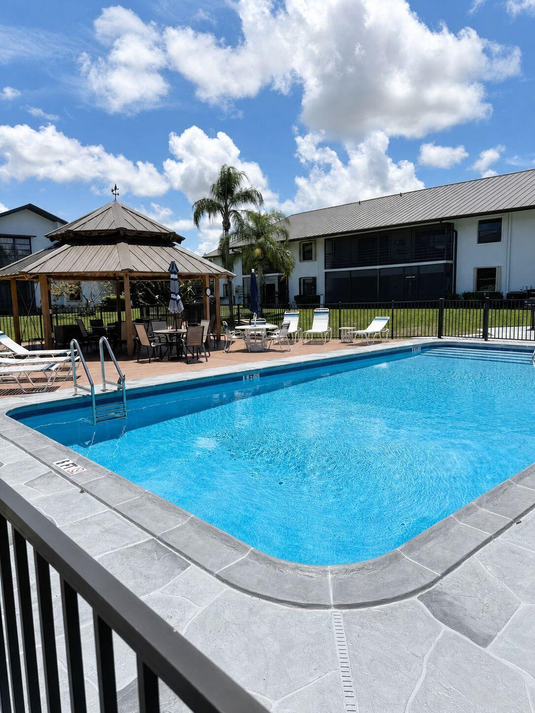 1871 Southwest Palm City Road, Unit G401 Stuart, FL 34994 - Photo 15 of 16 a view of a house with entertaining space