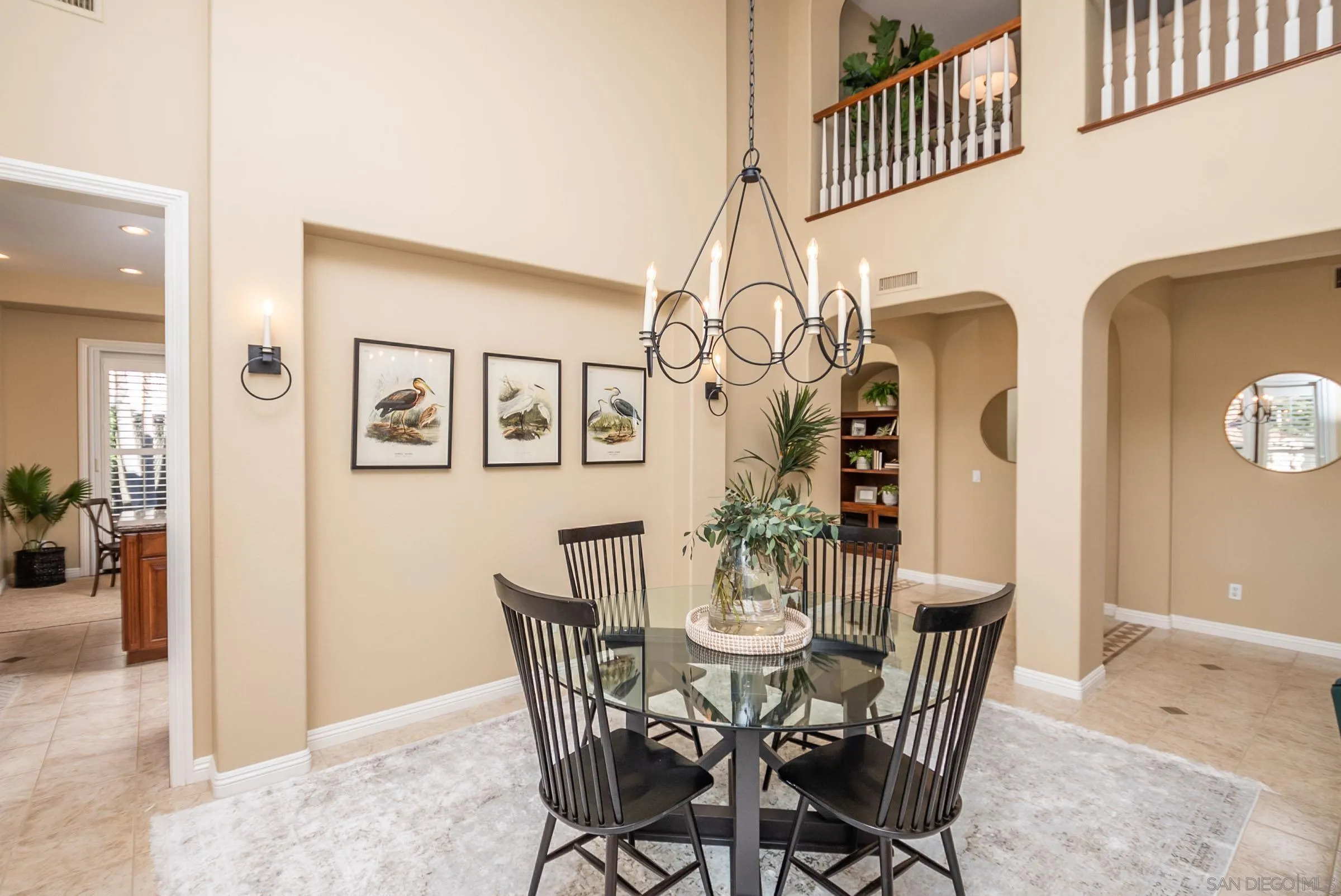 3008 Via Conquistador Carlsbad, CA 92009 - Photo 11 of 31 a view of a dining room with furniture and wooden floor