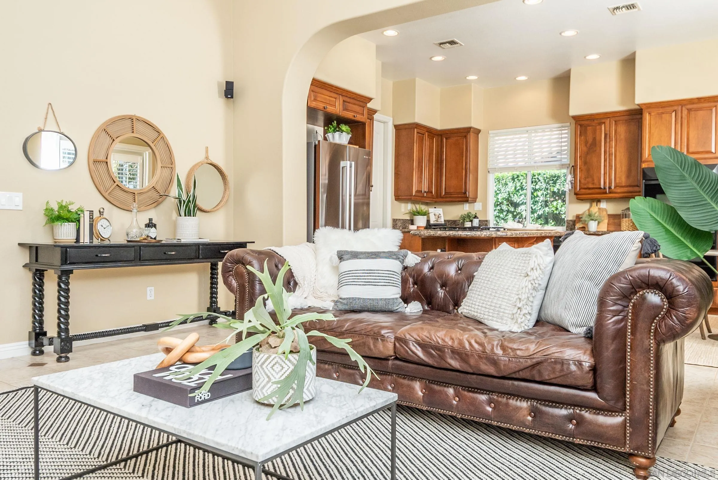3008 Via Conquistador Carlsbad, CA 92009 - Photo 13 of 31 a living room with furniture and a large window
