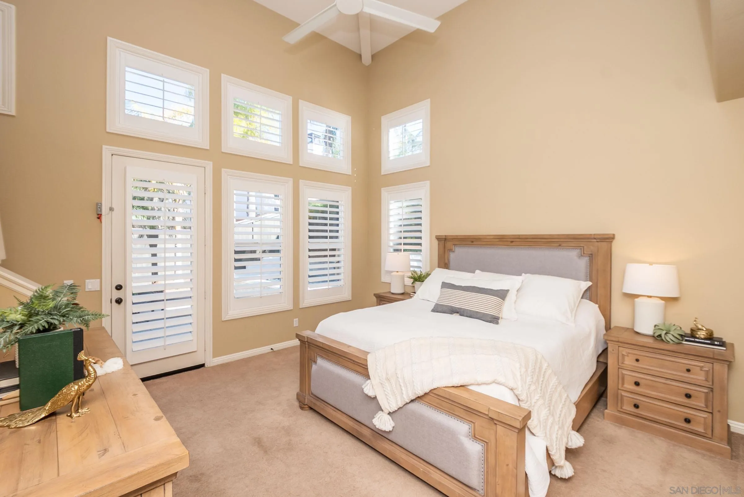 3008 Via Conquistador Carlsbad, CA 92009 - Photo 23 of 31 a bedroom with a bed and a window