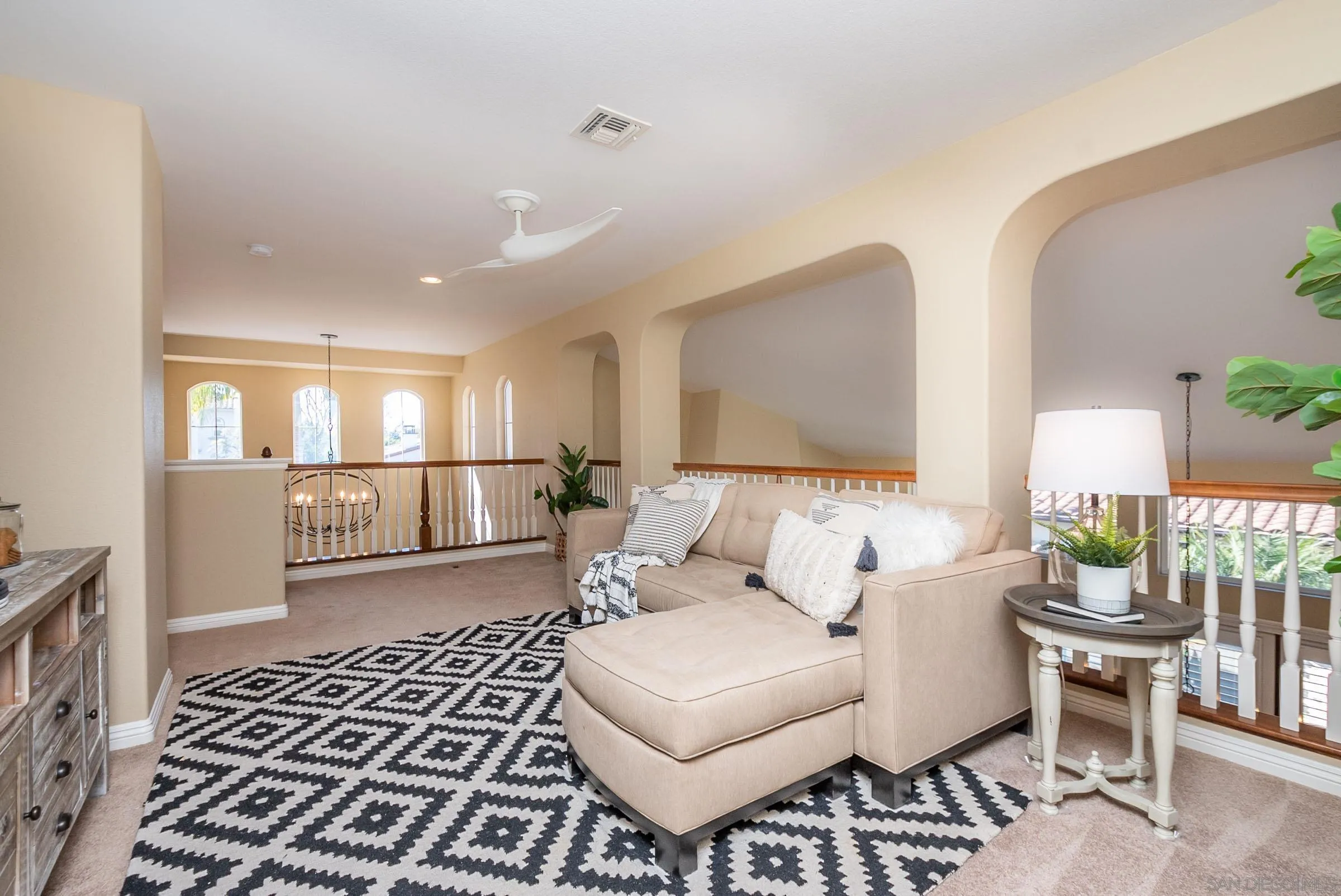 3008 Via Conquistador Carlsbad, CA 92009 - Photo 28 of 31 a living room with furniture and a table