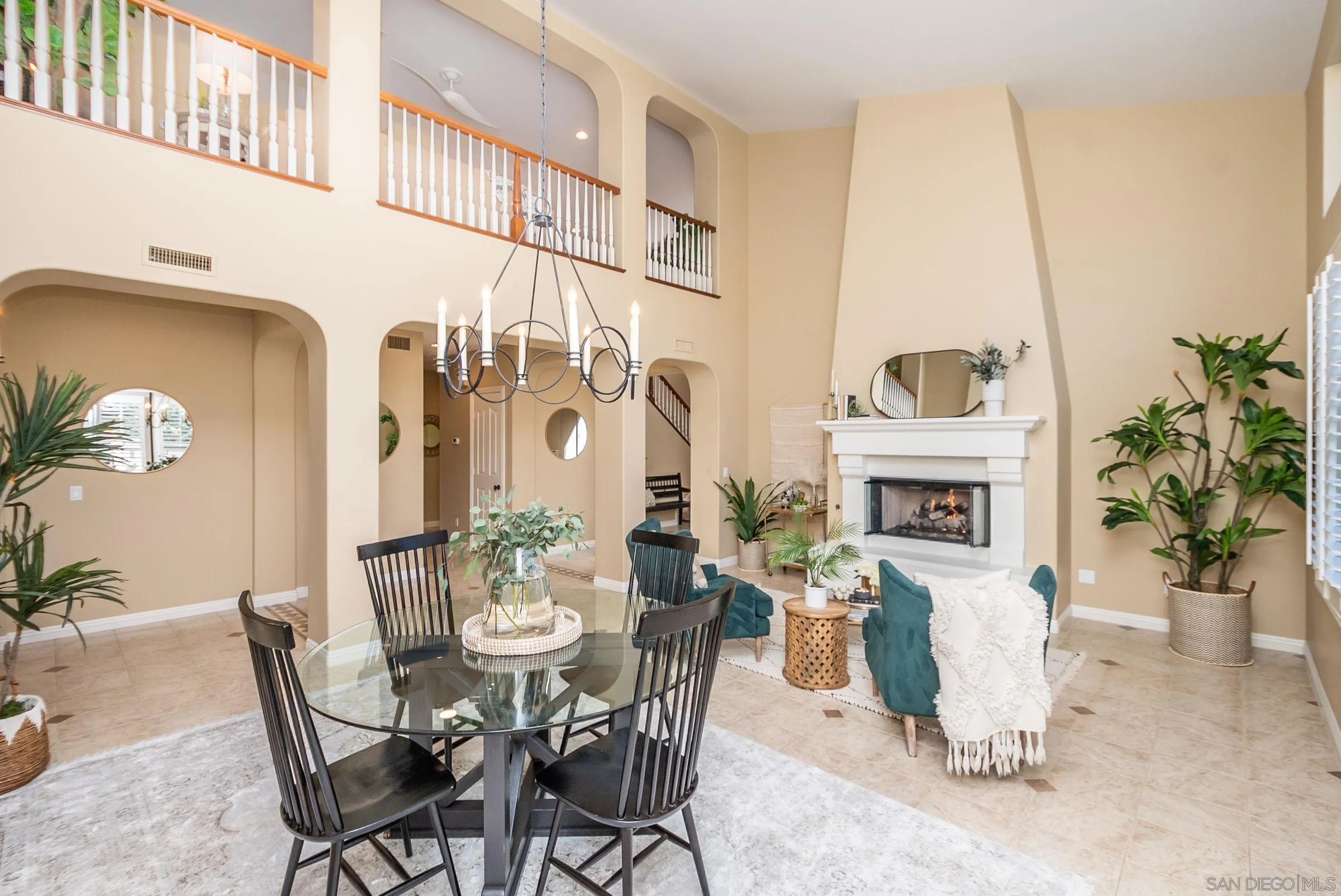 3008 Via Conquistador Carlsbad, CA 92009 - Photo 10 of 31 a view of a dining room with furniture window and wooden floor