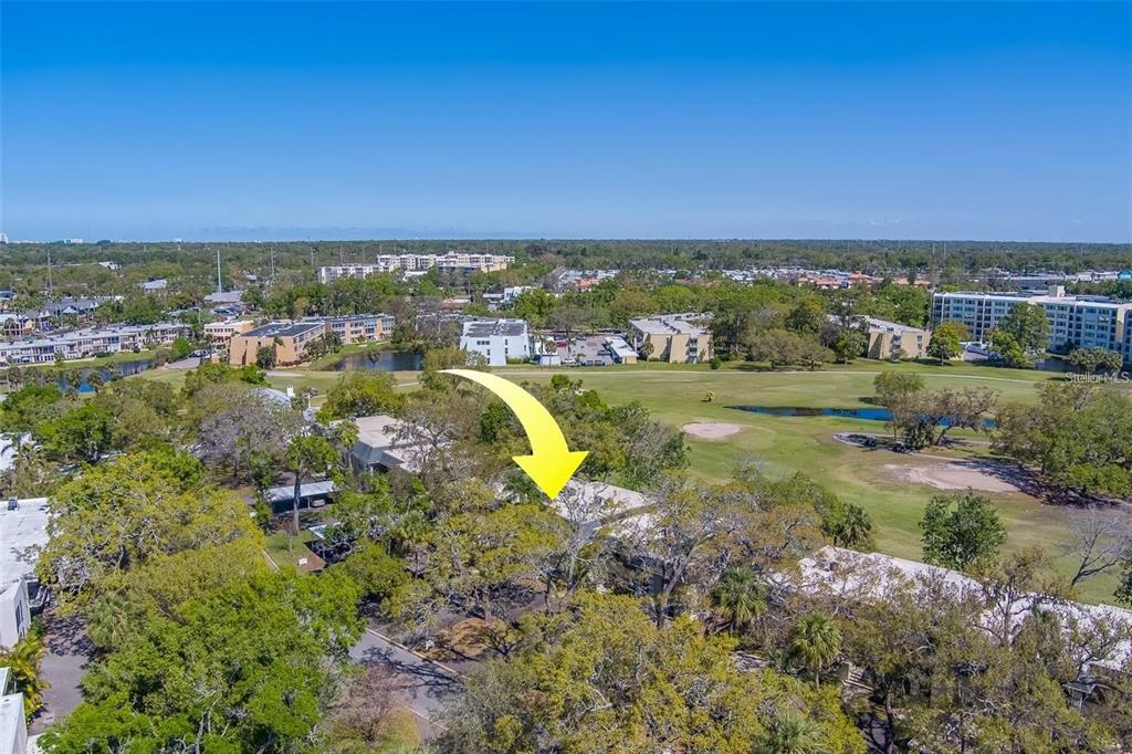 68 Country Club Drive Largo, FL 33771 - Photo 15 of 19 a view of a city with lots of residential buildings and ocean view