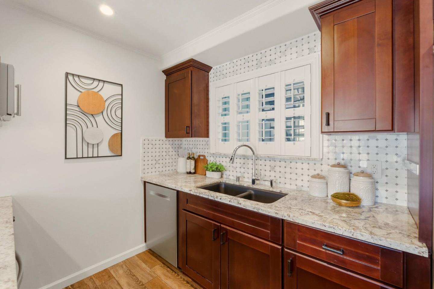 104 East Middlefield Road, Unit B Mountain View, CA 94043 - Photo 19 of 48 a kitchen with sink cabinets and window