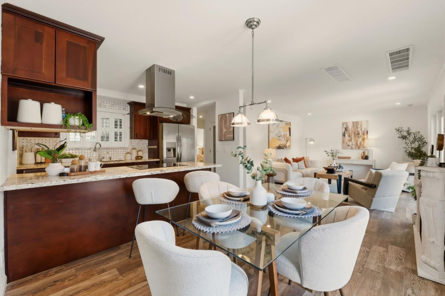 104 East Middlefield Road, Unit B Mountain View, CA 94043 - Photo 24 of 48 a dining room with furniture a chandelier and wooden floor