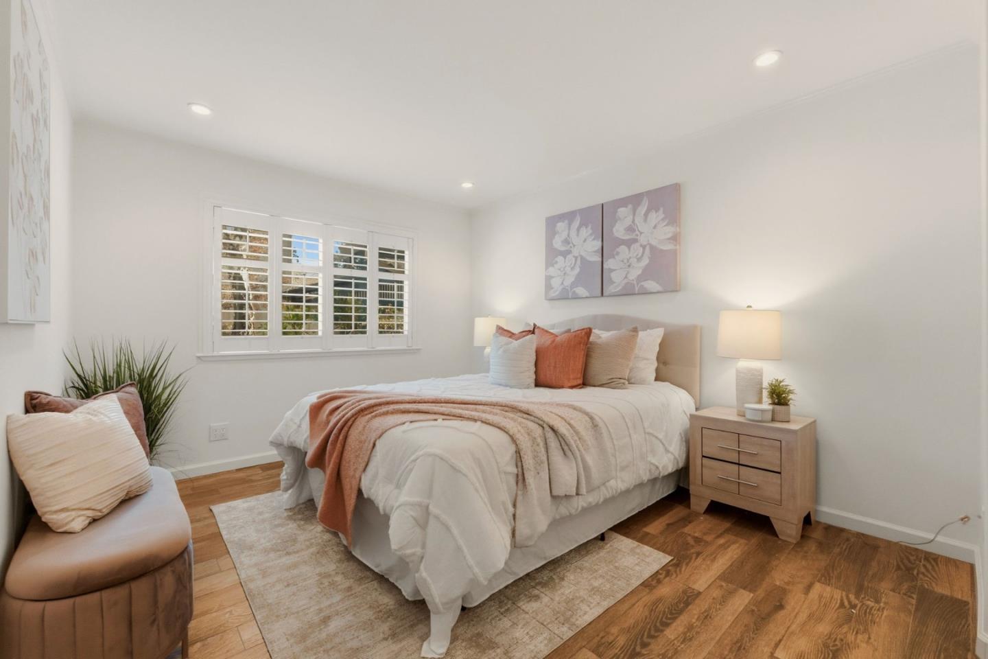 104 East Middlefield Road, Unit B Mountain View, CA 94043 - Photo 28 of 48 a bedroom with a large bed and a couch