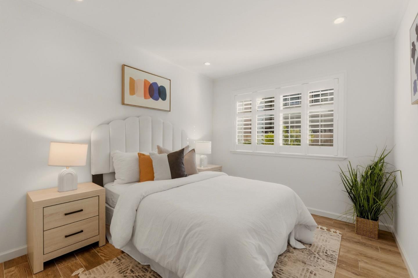 104 East Middlefield Road, Unit B Mountain View, CA 94043 - Photo 31 of 48 a bedroom with a bed and a potted plant