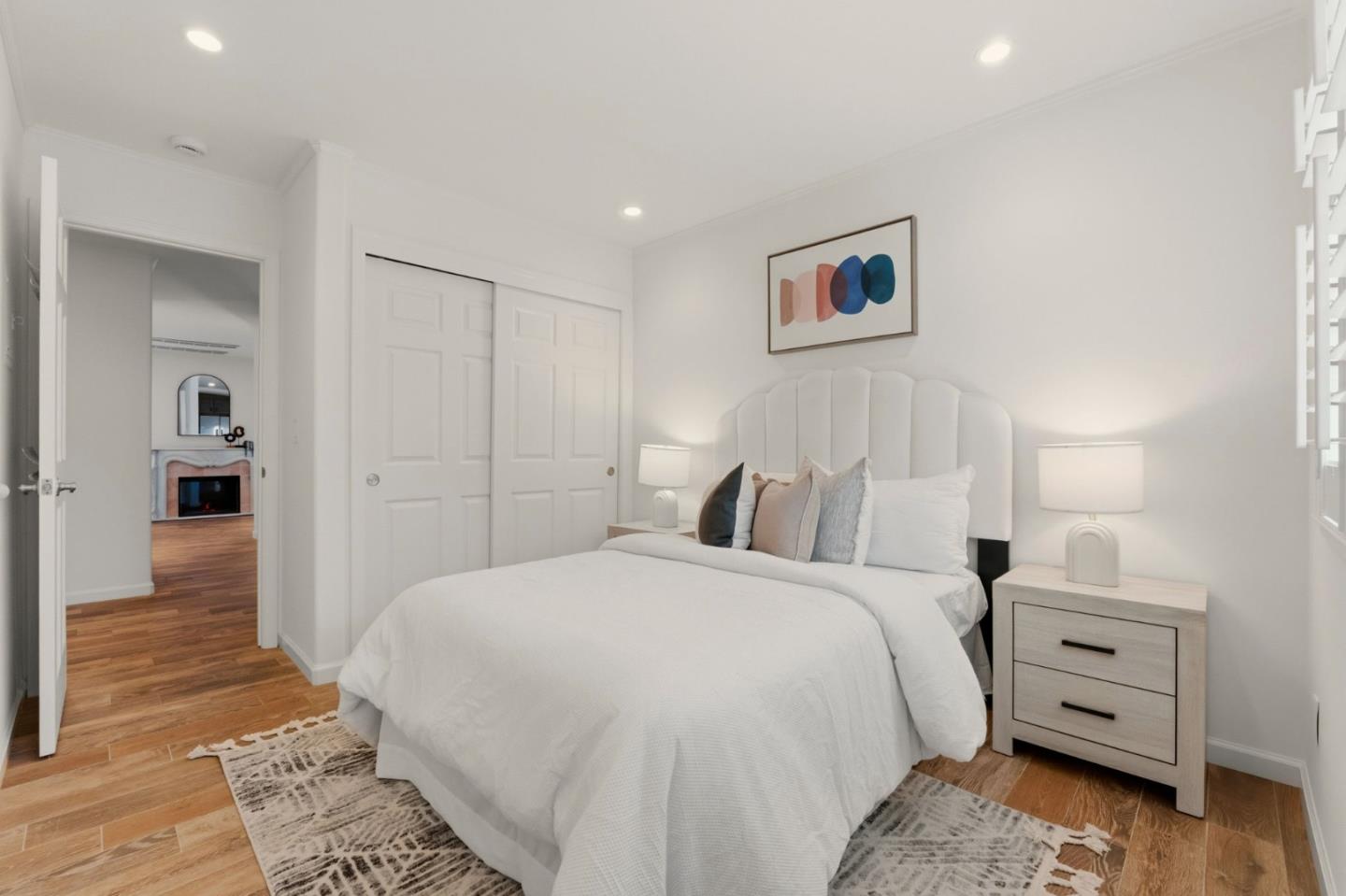 104 East Middlefield Road, Unit B Mountain View, CA 94043 - Photo 32 of 48 a spacious bedroom with a bed and a view of bathroom