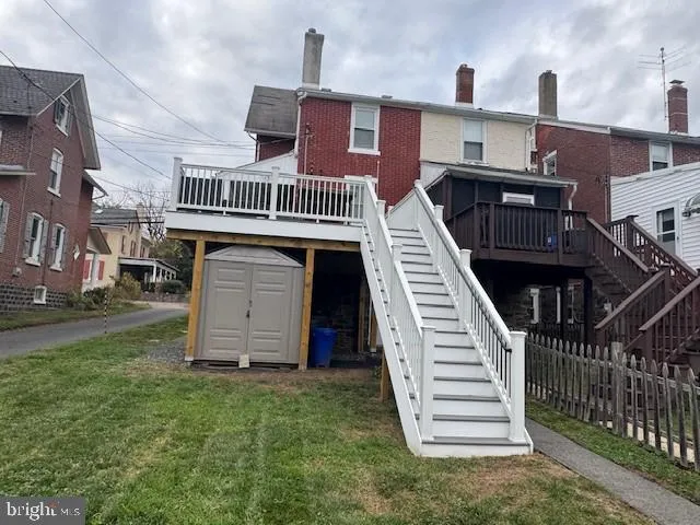 a view of a house with a deck