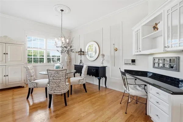 a kitchen with a sink and a large window