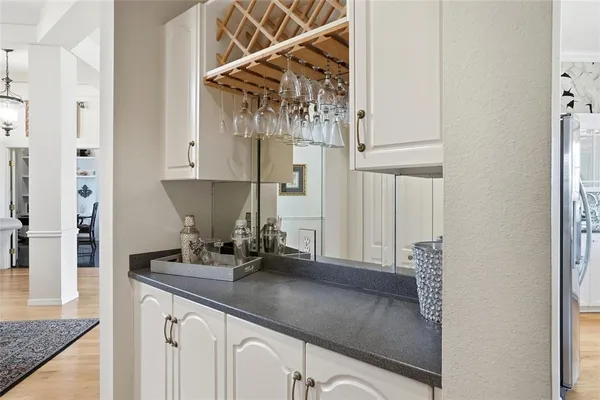 a kitchen with stainless steel appliances granite countertop a lot of counter top space
