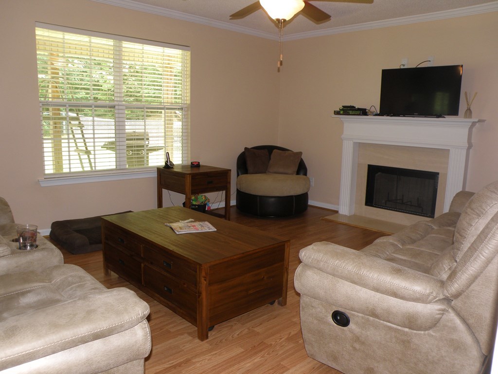 3375 Trotter''s Ridge Gray, GA 31032 - Photo 5 of 13 a living room with furniture and a fireplace